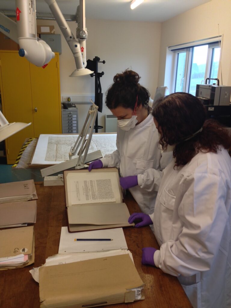 Trainee learning how to conserve archives